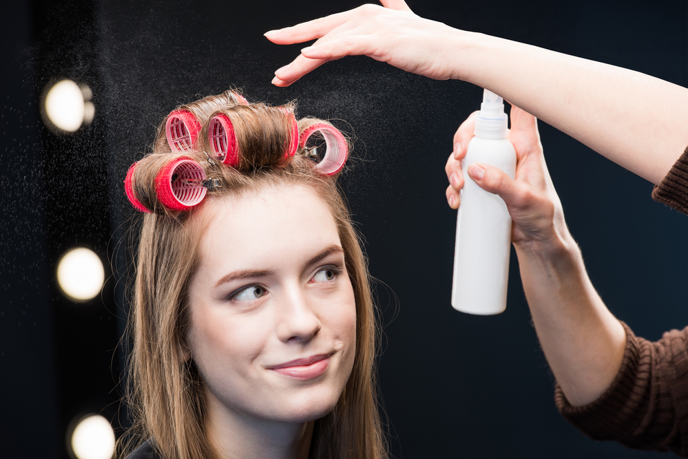 Woman with hairspray 